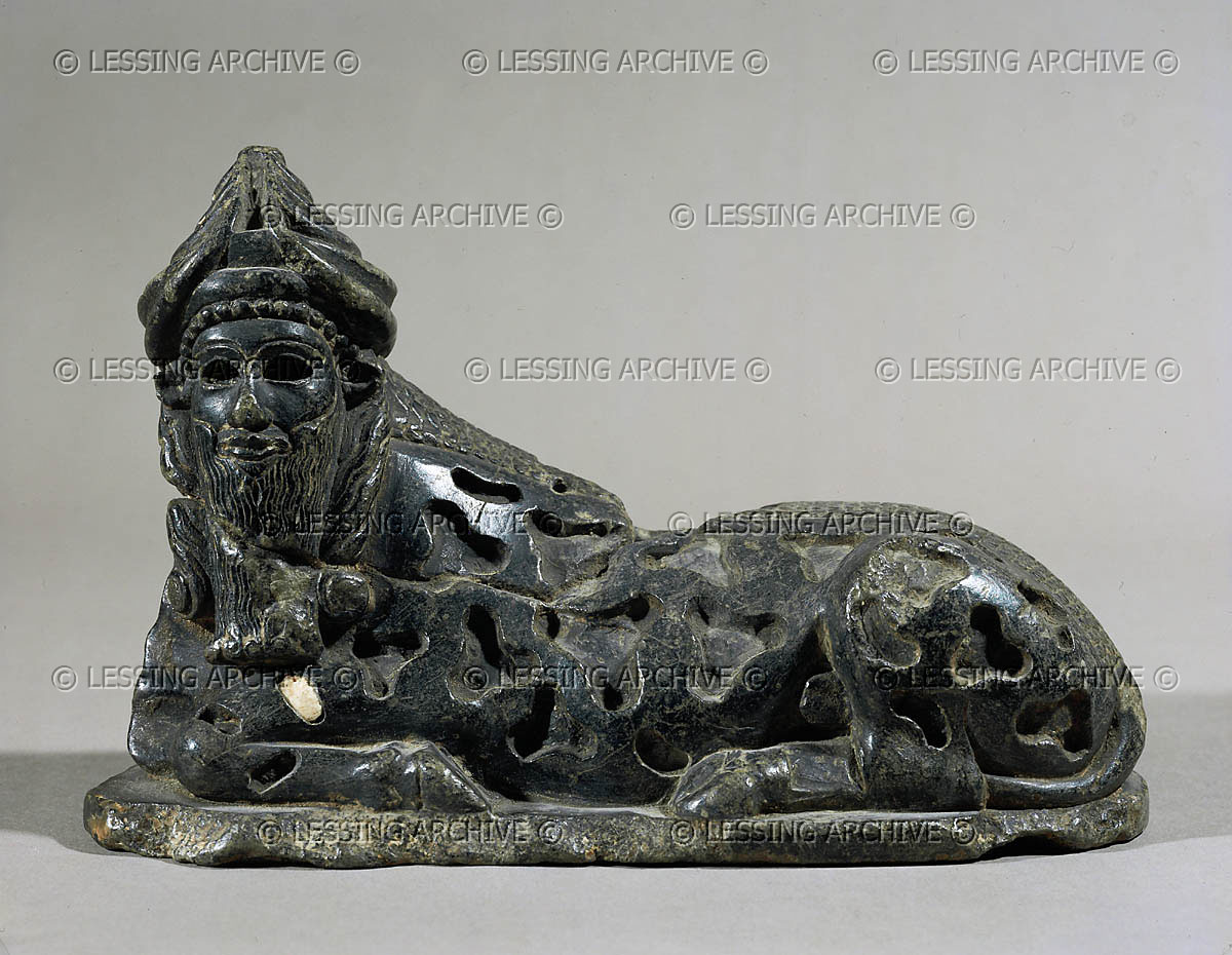 Bull with human head, period of king Gudea, around 2140 BCE. Blue-black steatite. AO 3146 See also: 08-02-13/52 (right)