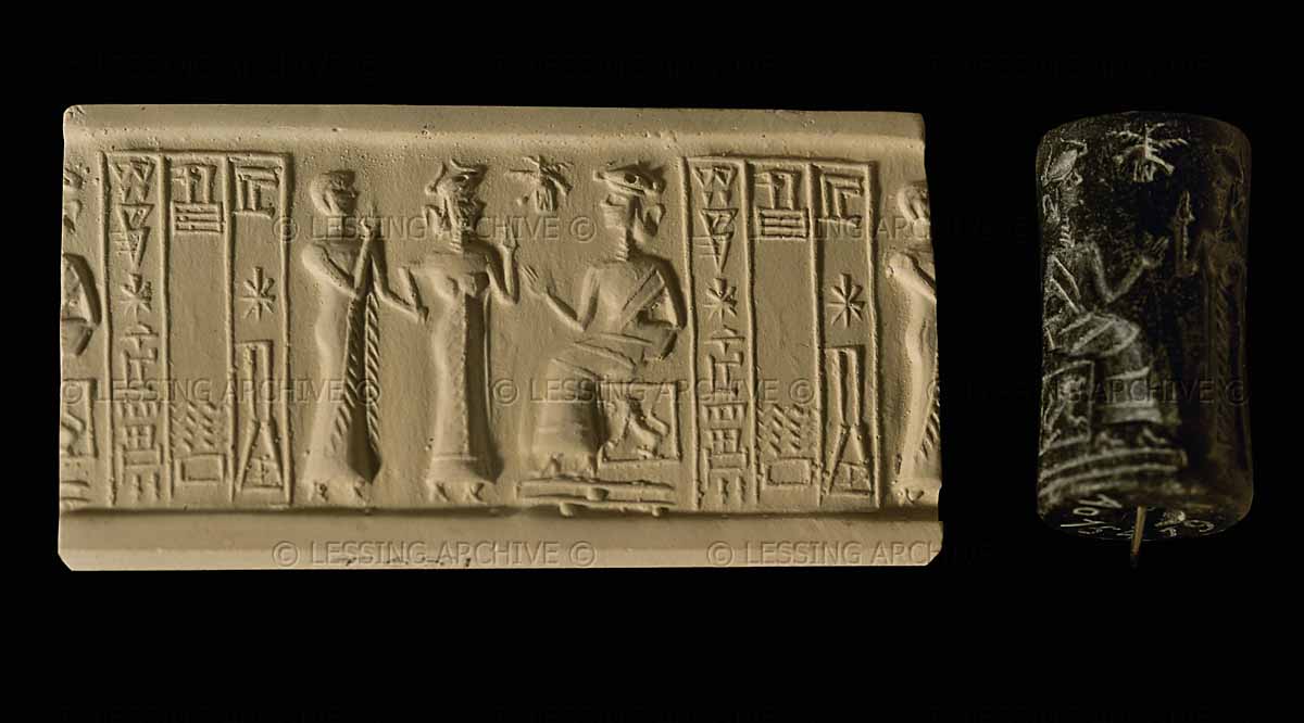 Cylinder seal: two orants before a goddess. Cuneiform inscription in the name of the scribe Ur-Nanshe. From Tello