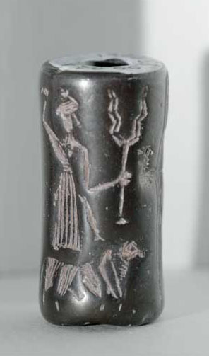 45 - Adad atop his bull symbol for Taurus, Forked Lightning symbol of Adad