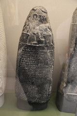 57 - Ninhursag's umbilical chord cutter on kudurru stone; the kudurru stones invoked the gods enforcement to the boundary, obey or face the gods 