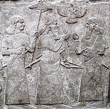 7j - Ashur hovers over protected semi-divine King Ashurnasipal II
